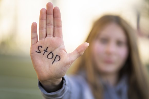 defocused-person-protesting-with-writing-hand-world-environment-day-outdoors (1)